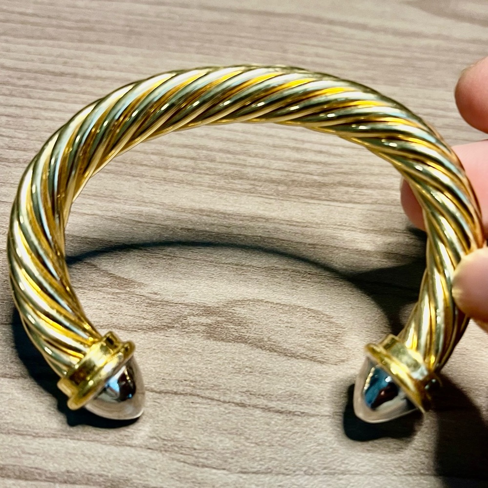 Heavy gold and sliver tone bracelet.